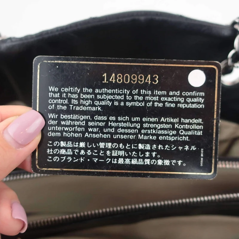 Chanel Black Quilted Caviar Leather Petite Timeless Bag