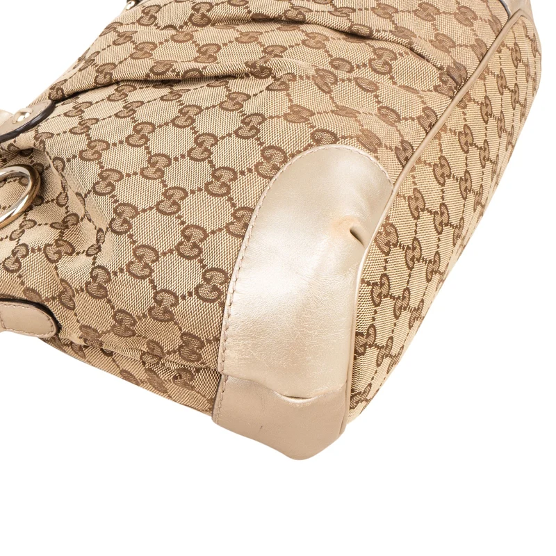 Gucci Monogram GG Canvas Metallic Leather Sukey Handbag