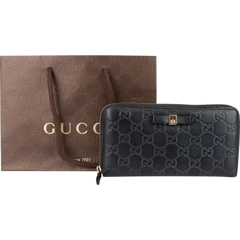 Gucci Guccissima Leather Bow Zip Around Wallet