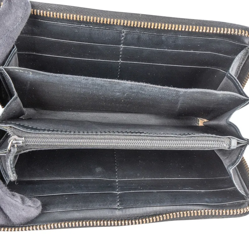 Gucci Guccissima Leather Bow Zip Around Wallet