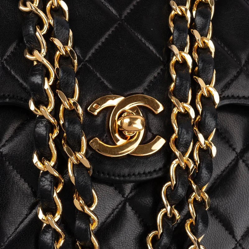 Chanel Quilted Lambskin 24K Gold Jumbo Double Flap Shoulder Bag