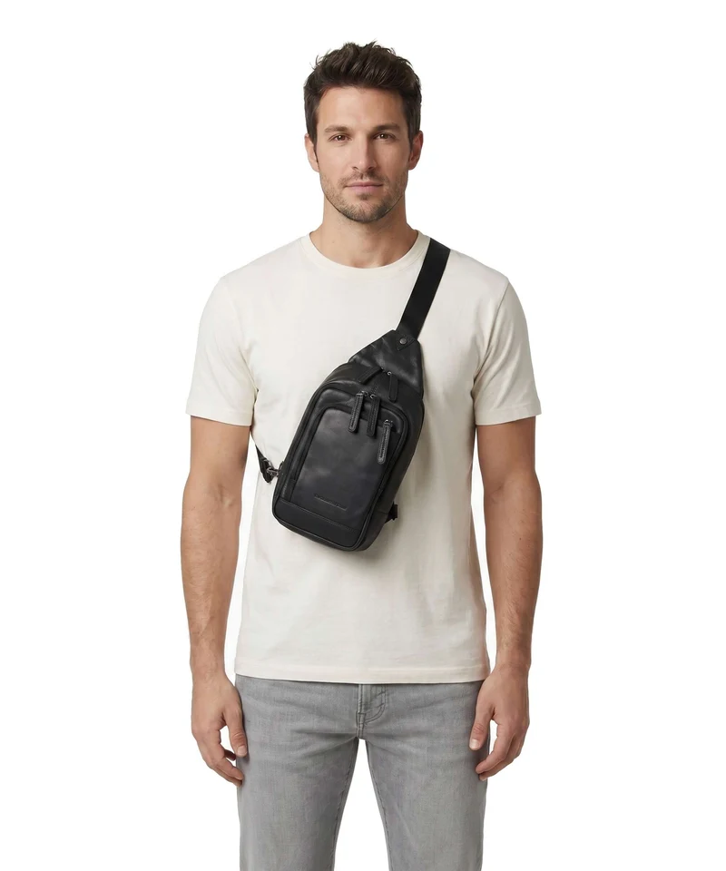 The Chesterfield Brand Wax Pull Up Cow Riga Slingbag black