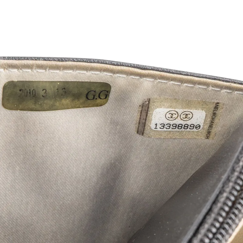 Chanel Camellia Embossed Wallet on Chain Crossbody Bag