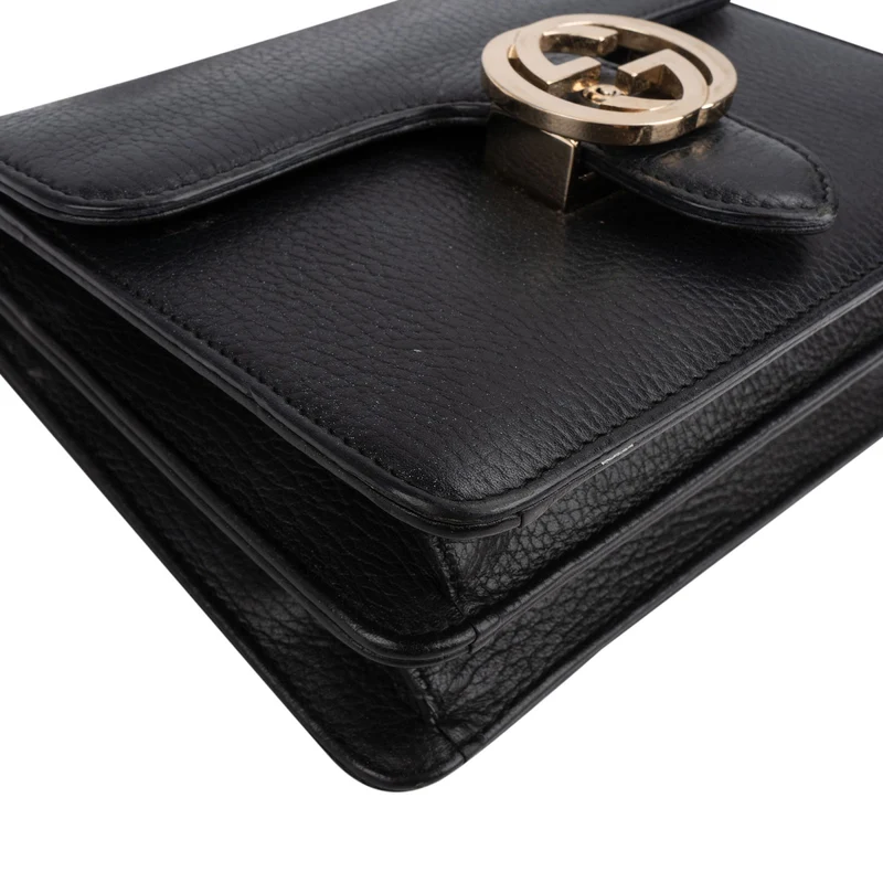 Gucci Pebbled Leather Interlocking GG Flap Crossbody Bag