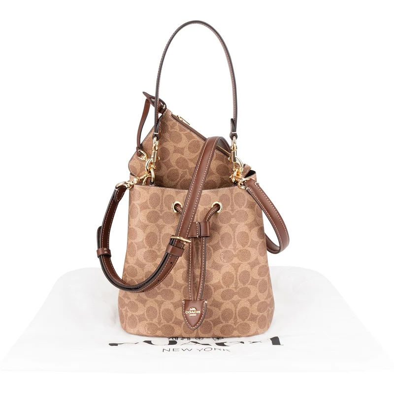 Coach Monogram Signature Canvas Small Drawstring Bucket Crossbody Bag