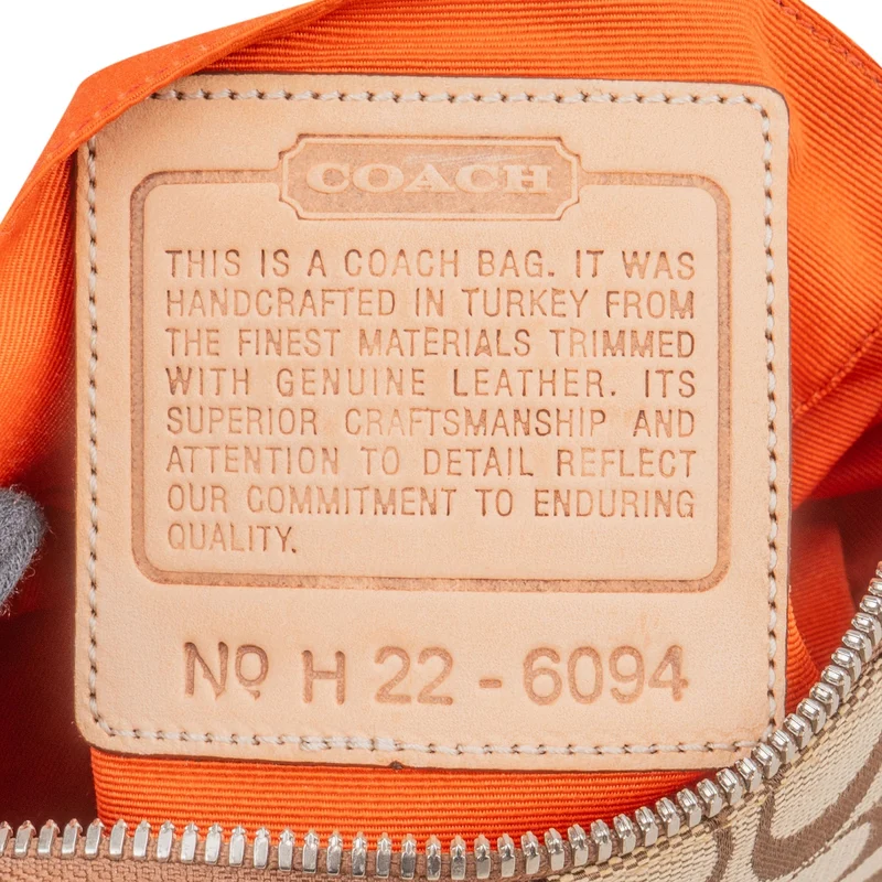 Coach Signature Monogram Pochette Handbag