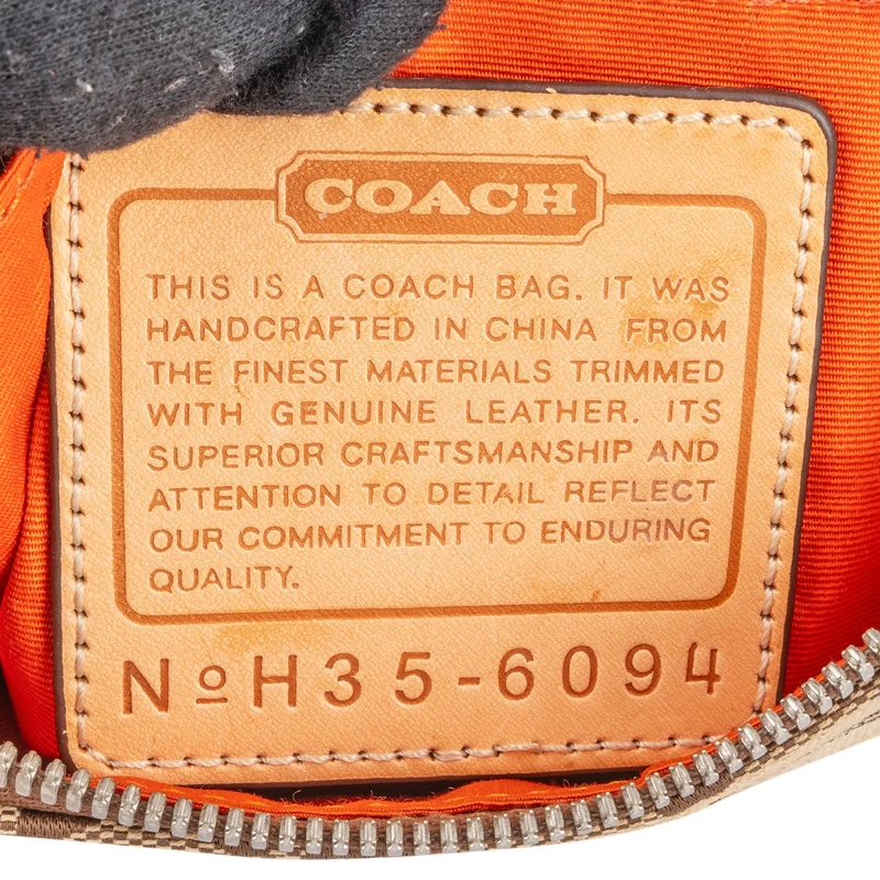 Coach Signature Monogram Pochette Handbag