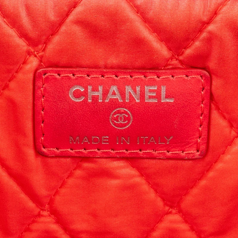 Chanel Quilted Patent Leather CC Clutch