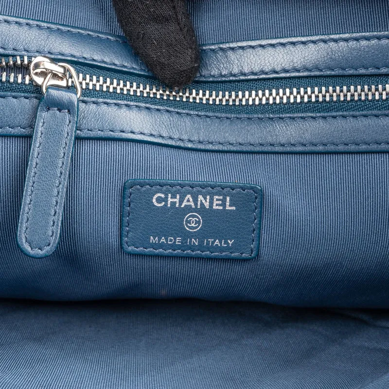 Chanel Quilted Lambskin CC Pouch Clutch