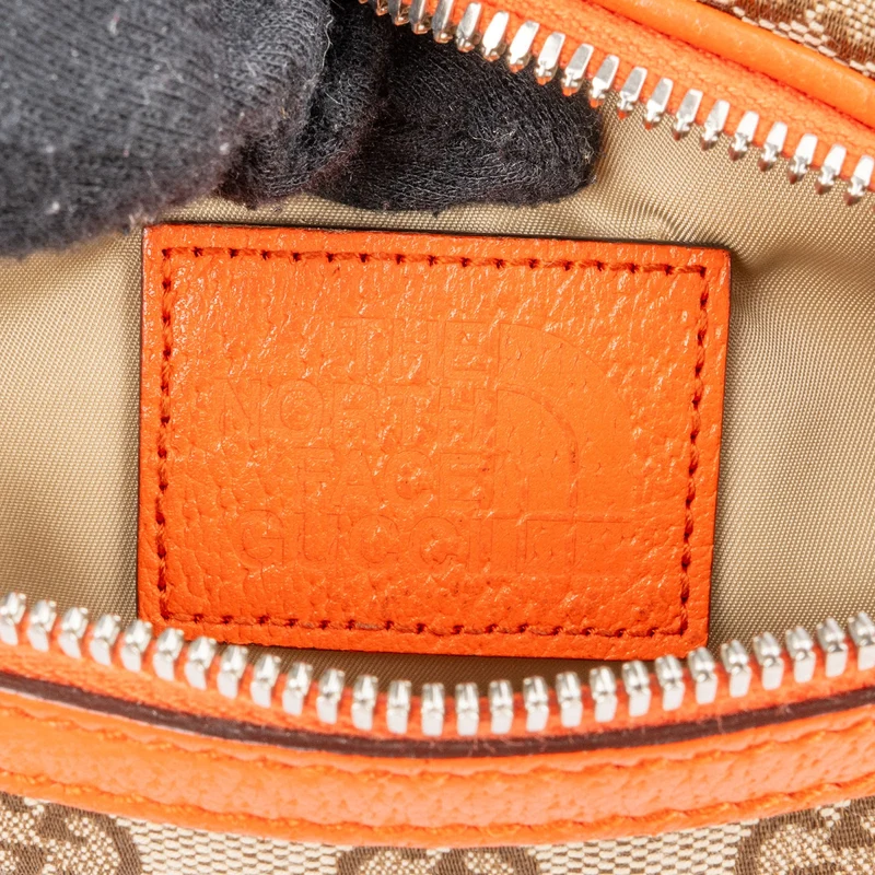 Gucci x The North Face Orange Leather Monogram GG Canvas Belt Bum Bag Crossbody Bag