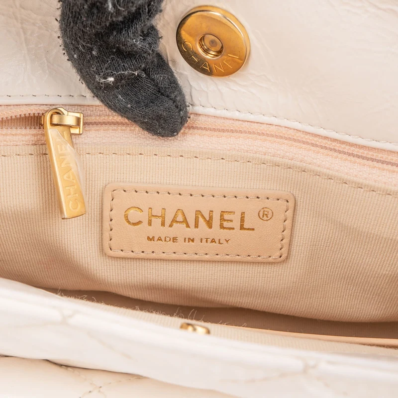 Chanel Quilted Leather Small Wavy CC Crossbody Bag