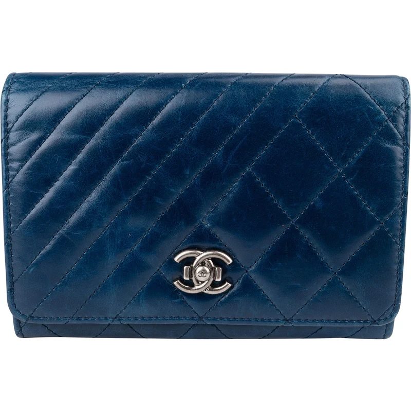 Chanel Aged Calfskin Chevron Quilted Flap Wallet