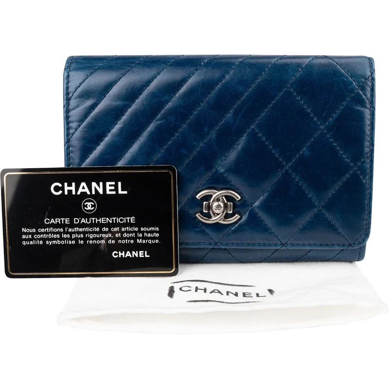 Chanel Aged Calfskin Chevron Quilted Flap Wallet
