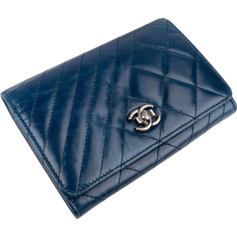 Chanel Aged Calfskin Chevron Quilted Flap Wallet